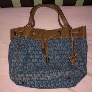 Micheal khors woman’s purse worn 1x